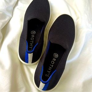 Rothy’s original slip on sneaker W7 Black with signature blue, white halo heel